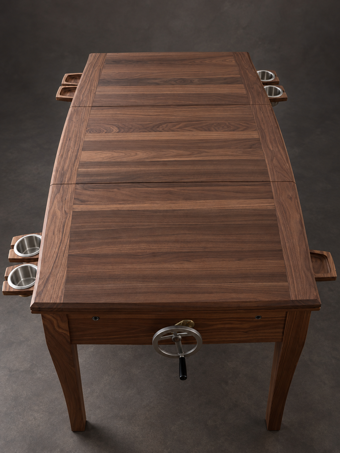 SIEGE dining top in American walnut with pull-out cup holders and hand crank